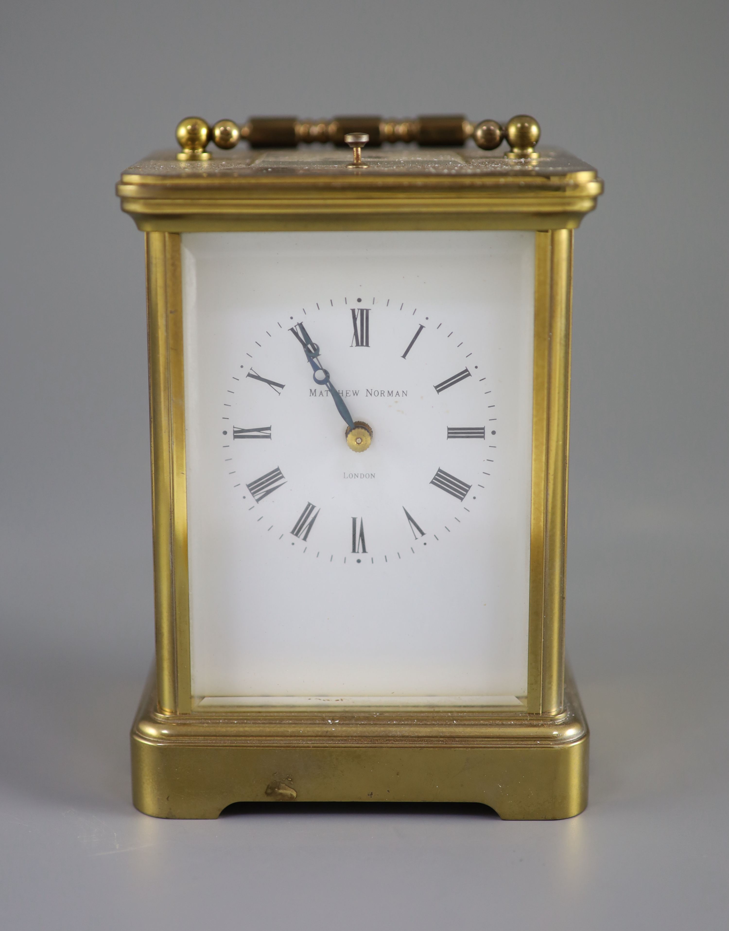 A large Swiss-made brass carriage clock, Matthew Norman, London, 20th century 14cm high.